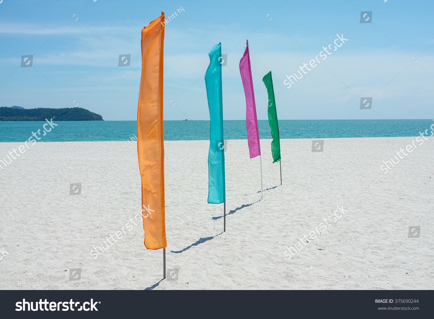 colored flags on the beach
